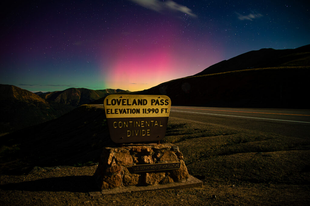 Loveland Pass Sign with Northern Lights Colorado Astrophotography